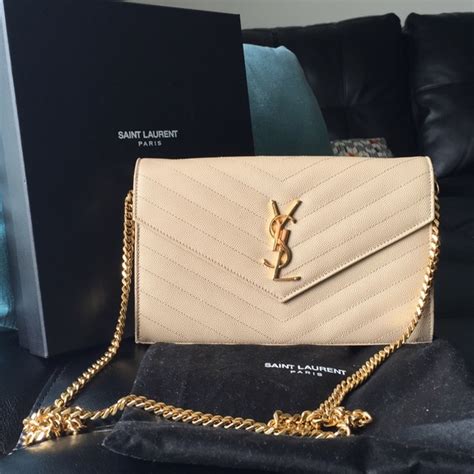 cream ysl clutch|YSL large clutch.